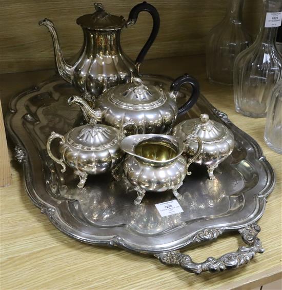 A five piece plated tea and coffee service and a two handled plated tea tray